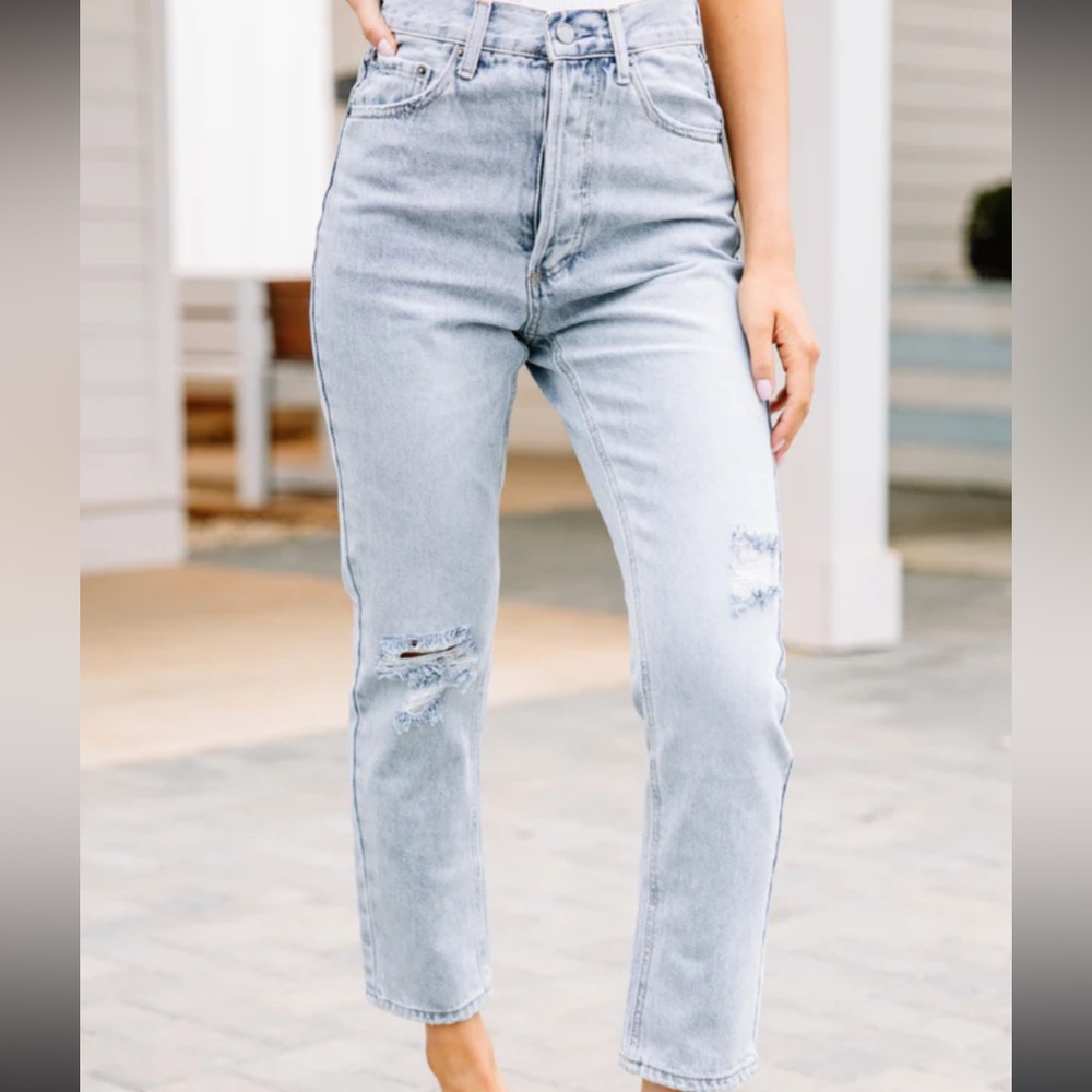 Vintage Calvin Klein high waisted straight leg light wash jeans.